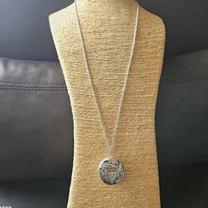 Vintage Silver-tone Radial Cutout Leaf Design with Crystal Interior Pendant
